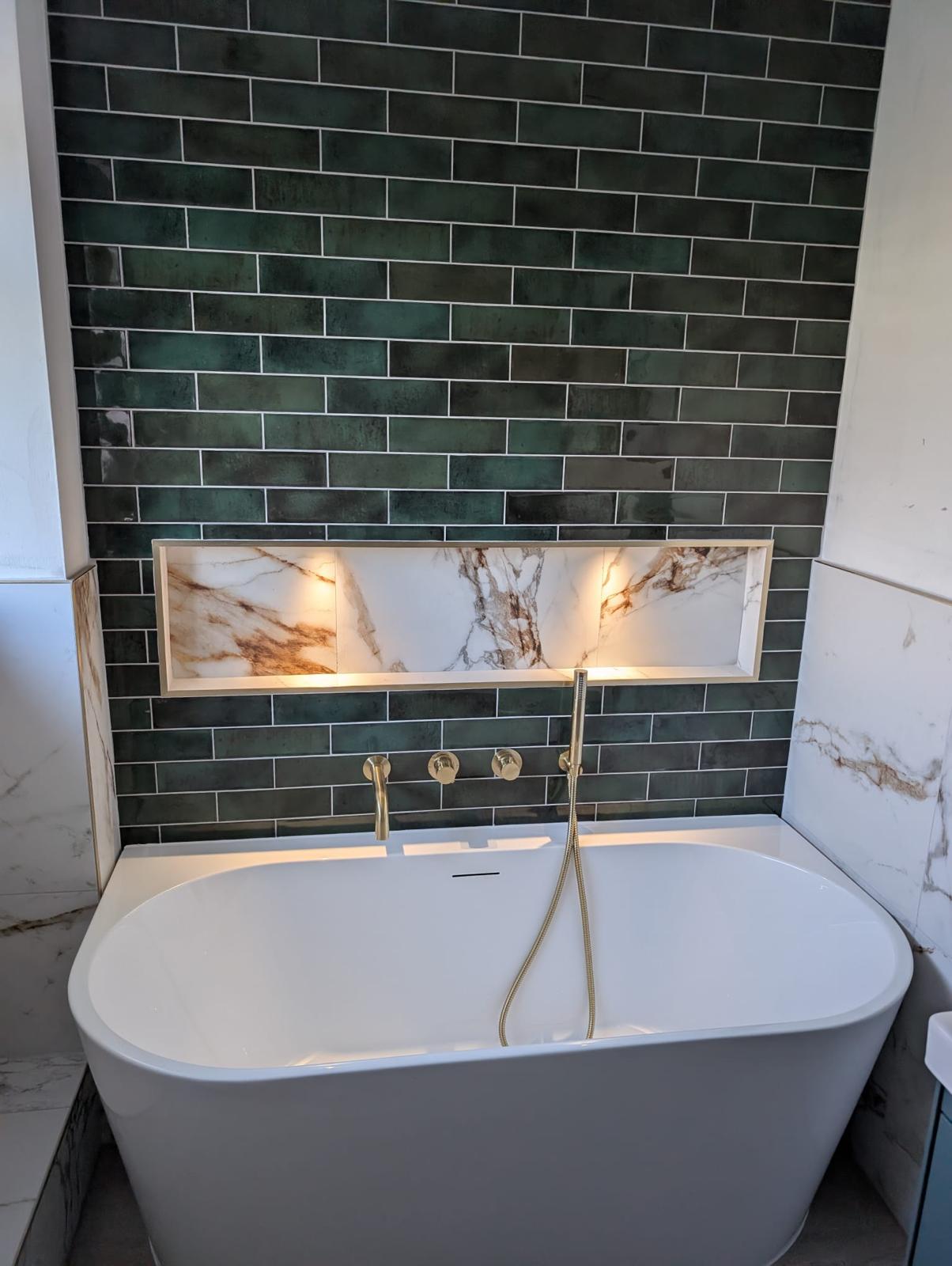 Freestanding bath and completed bathroom suite