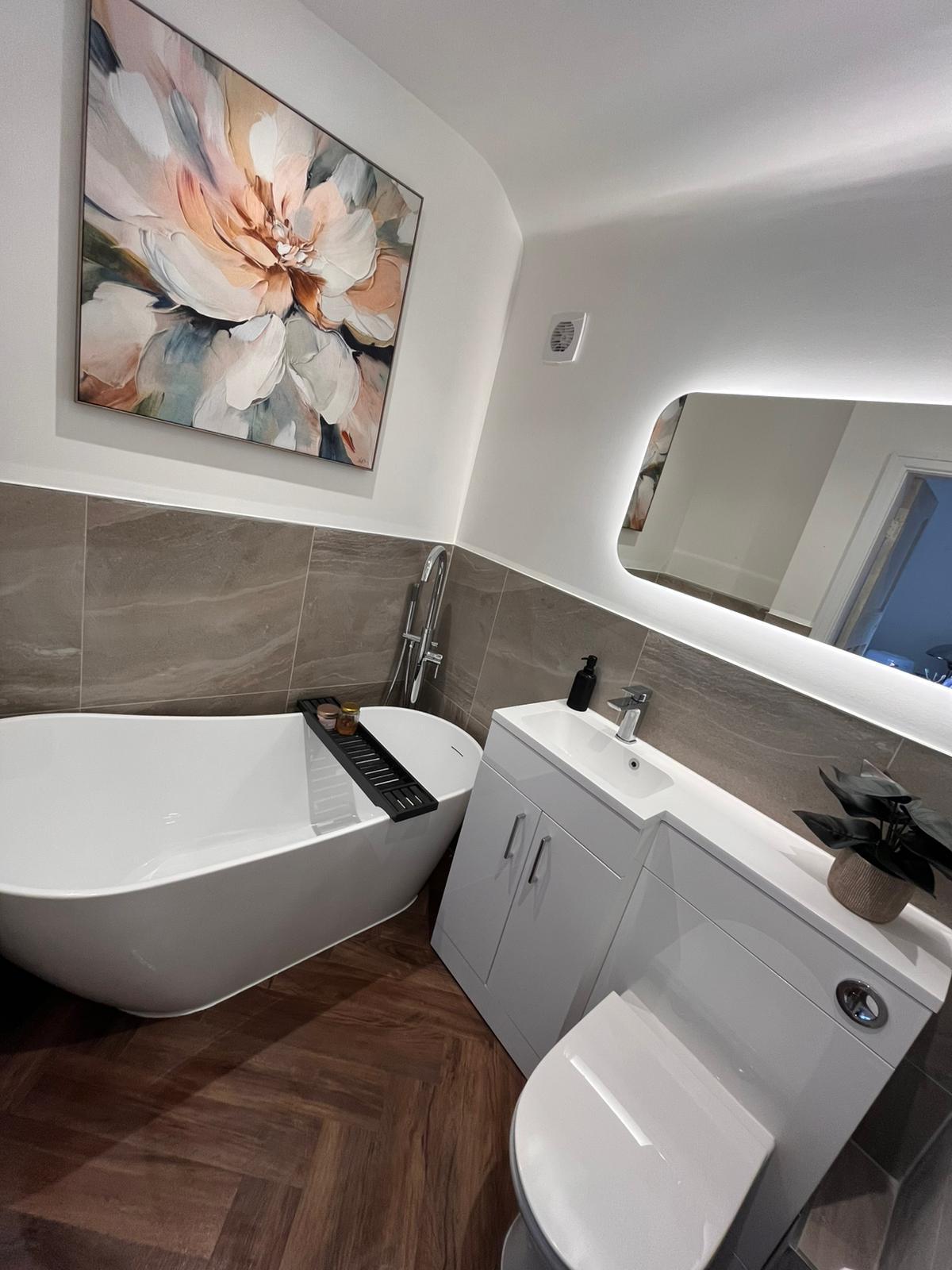 Bathroom vanity unit, mirror and coordinated bathroom fittings